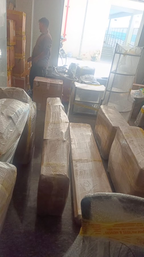 Packed cartons and furniture handled by Paradise Packers and Movers